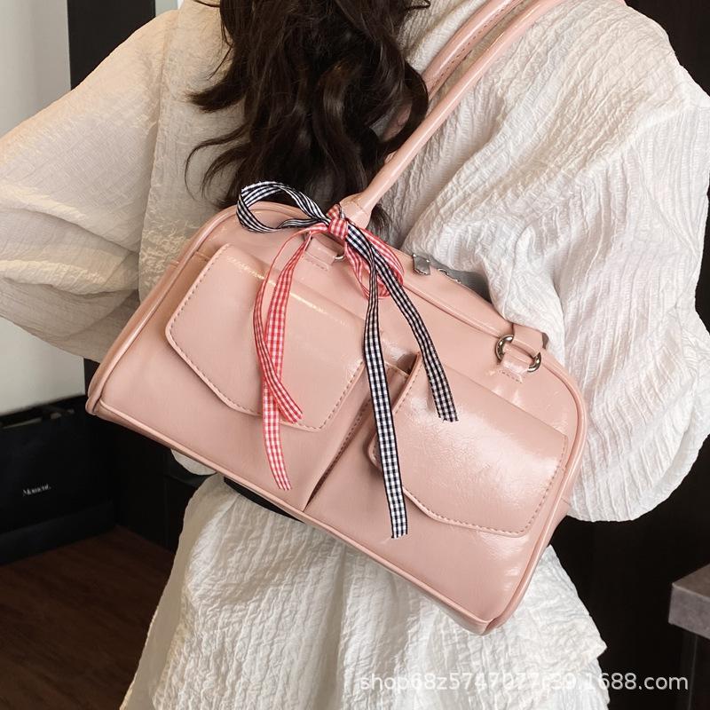Korean Internet celebrities with the same bowling bag 2025 new niche Boston shoulder bow portable underarm women's bag