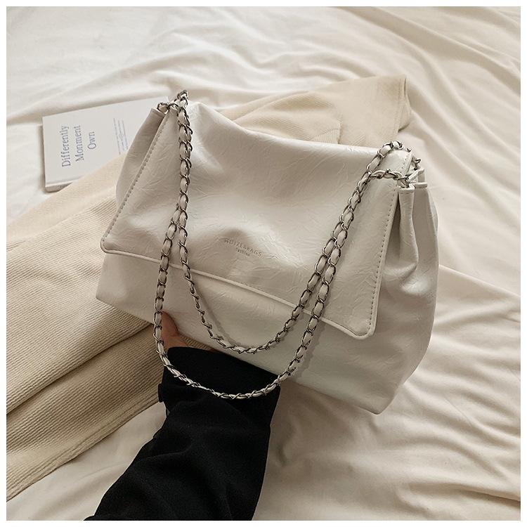 

Сумка большой вместимости женская 2025 новая высококлассная сумка-тоут студентка колледжа простая универсальная цепочка подмышечная на плечо белый