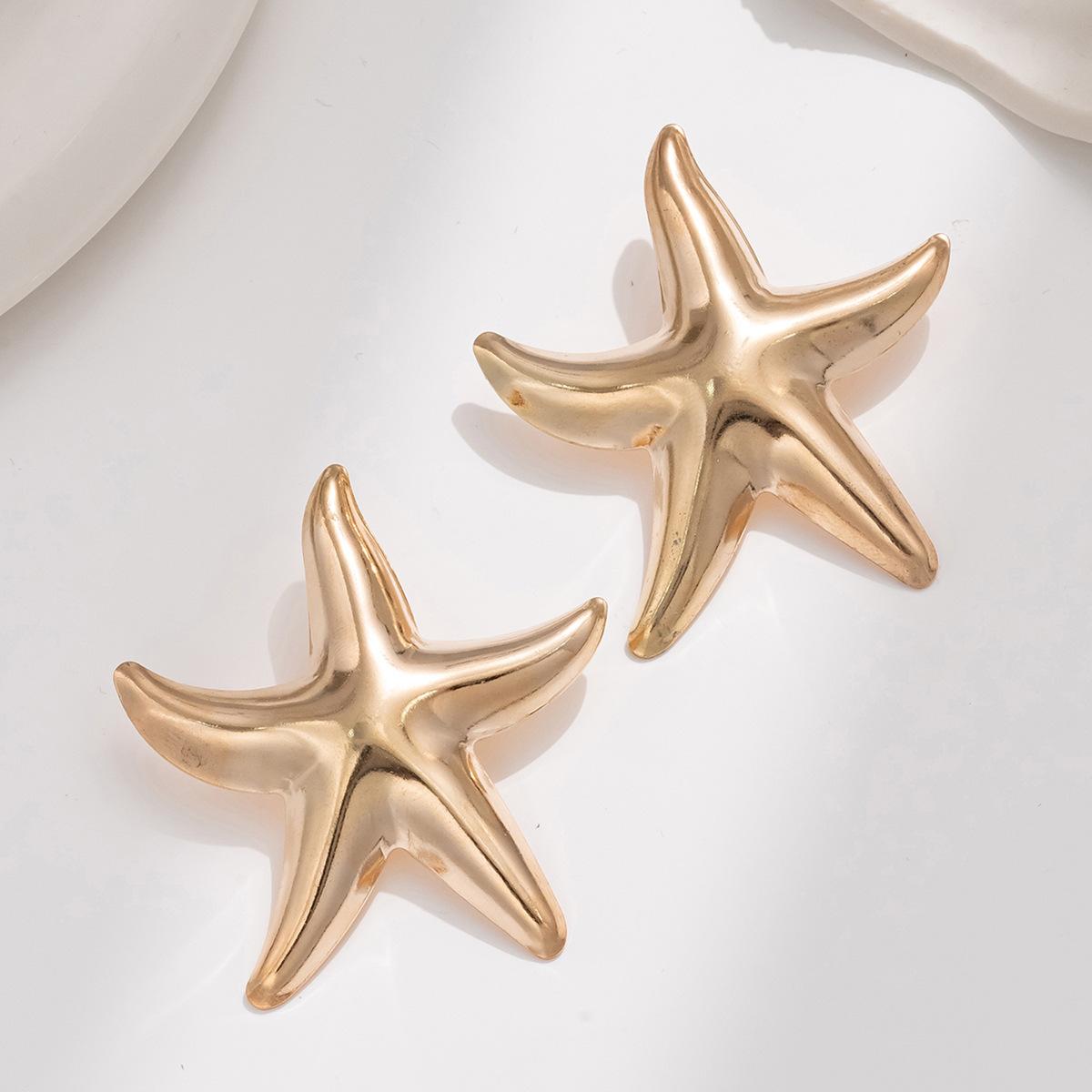 

Gold earrings European and American alloy jewelry accessories niche high sense personality exaggerated starfish earrings women