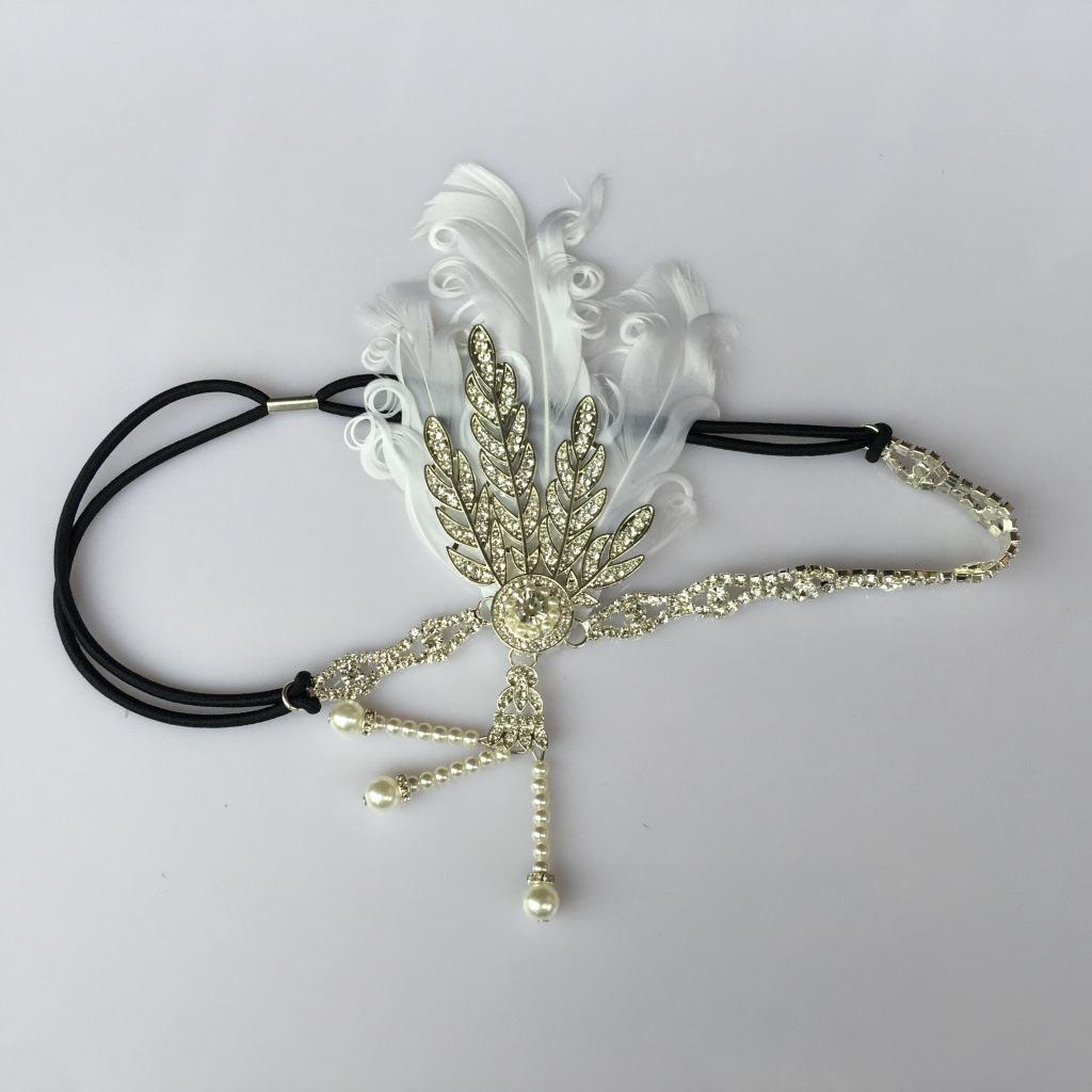 Cocar vintage de penas e strass para festa étnica ou palco