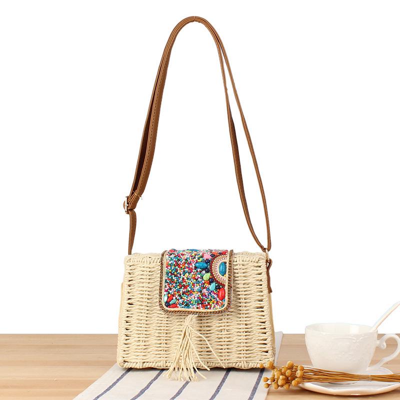 Minimalistisk vävd crossbody-väska i pappersrep för semester vid havet