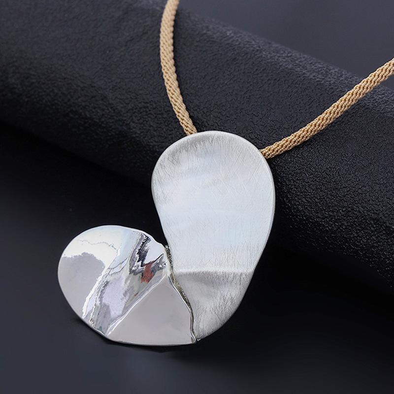 New women's necklace long high fashion retro personality trend pendant European and American