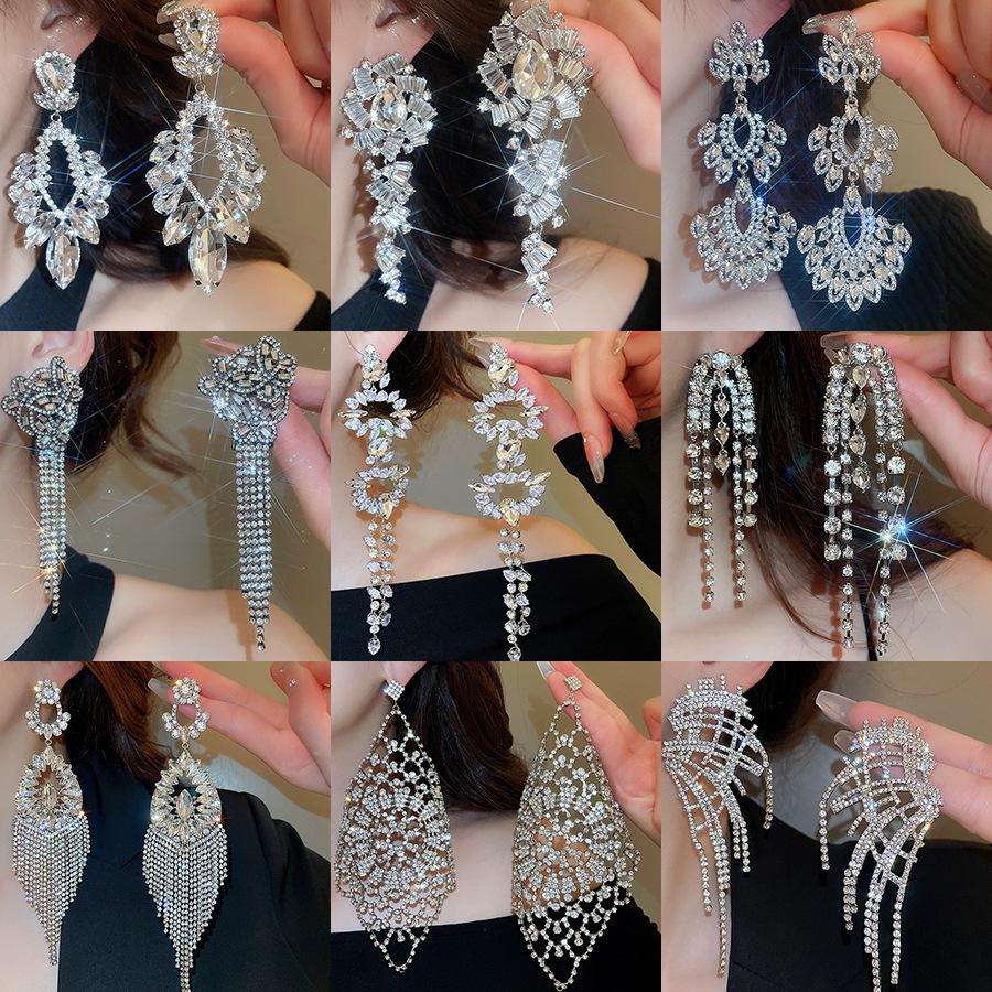 Silver Needle Water Drop Tassel Earrings - Light Luxury High-End Design for Women's Fashion.