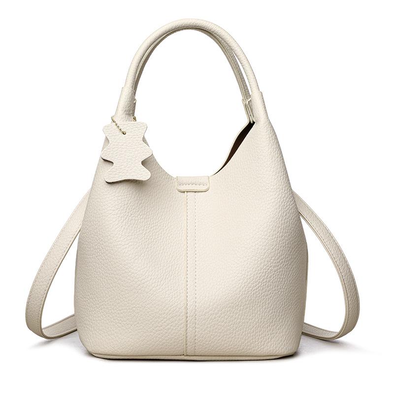 2025 High-End Genuine Leather Women's Shopping Basket Bag with Double-Sided Texture and Leather Tag.
