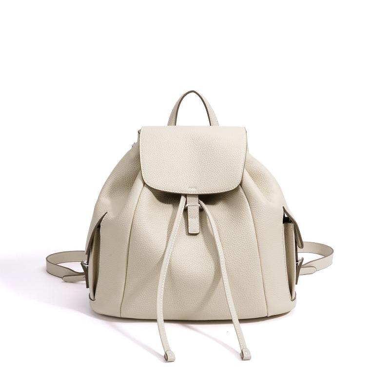 

Casual drawstring flip backpack women s early spring niche literary commuter portable leather women s bag