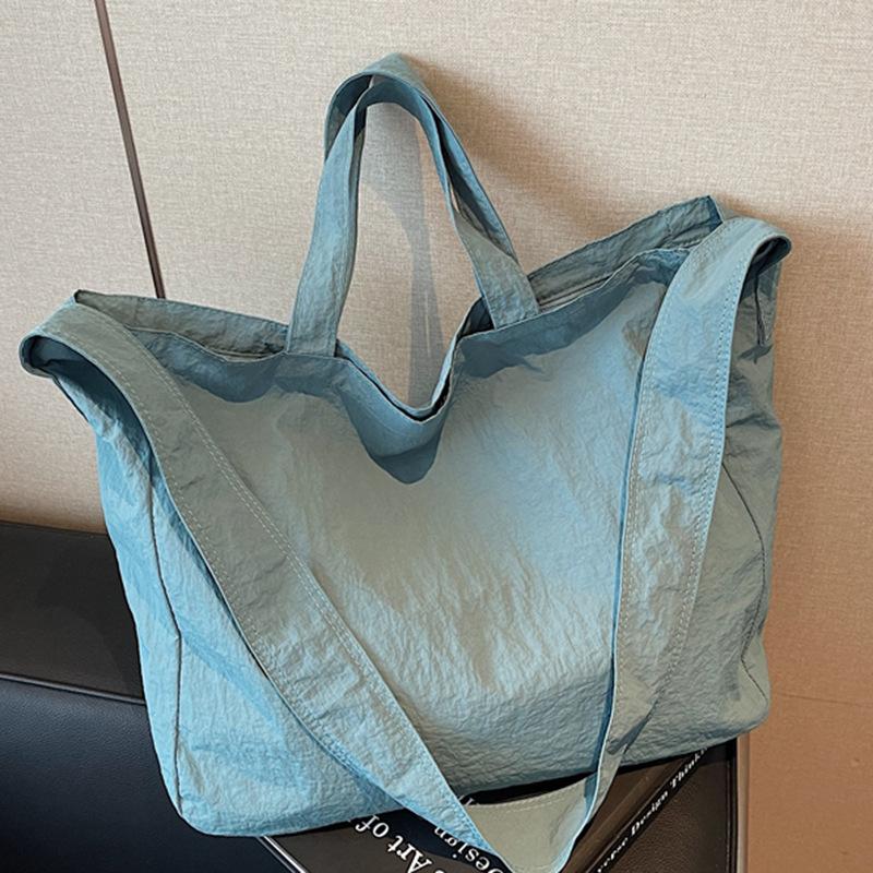 Large Capacity Commuter Tote Bag 2025 Autumn New Casual Fashion Simple Only Beautiful Woman College Student Bag