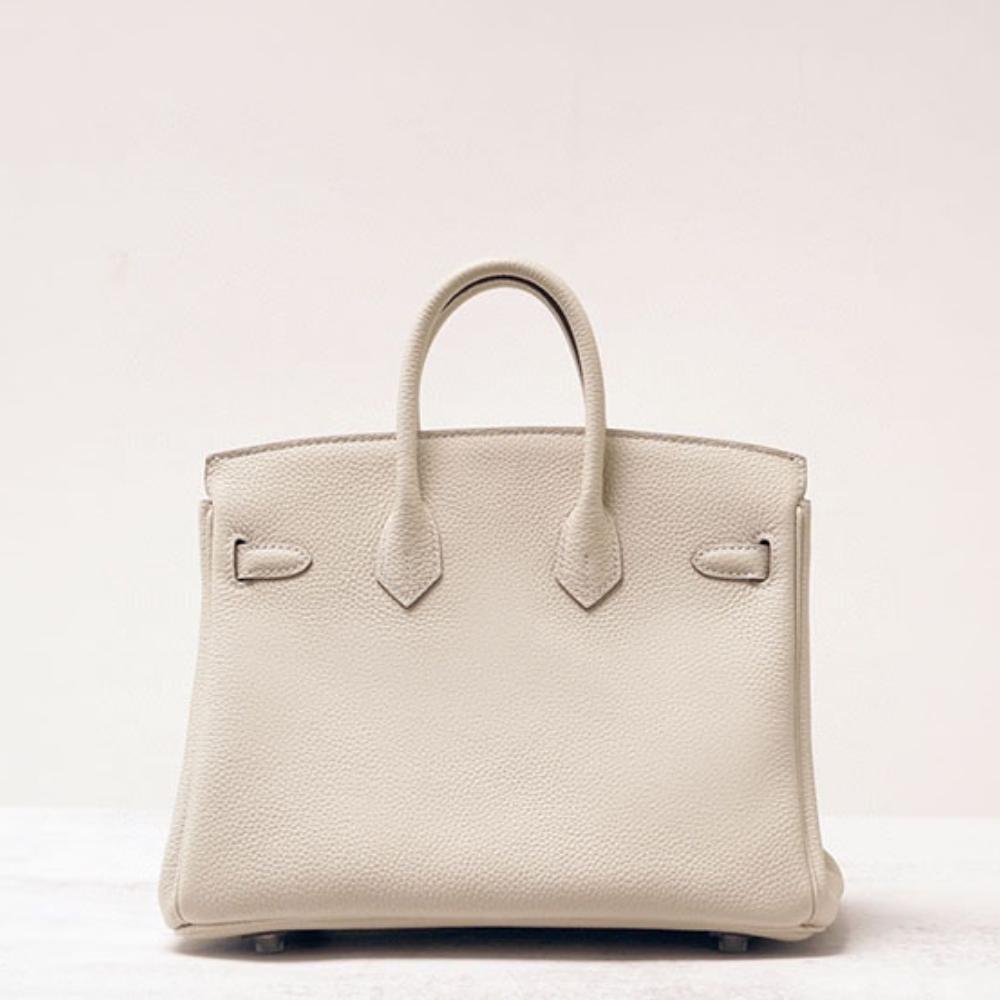 Høykvalitets spesiallaget semi-vokset tråd semi-håndsøm stålbeslag importert togo toppnarvet kuskinn håndveske med en følelse av luksus