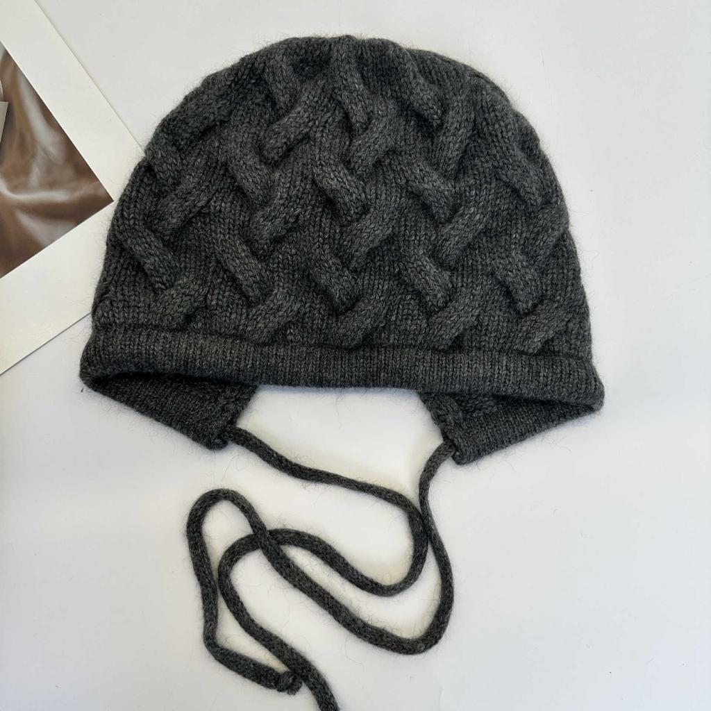 Retro twist pattern ear protection knitted hat women's autumn and winter lace-up bow wool hat warm cover cold hat