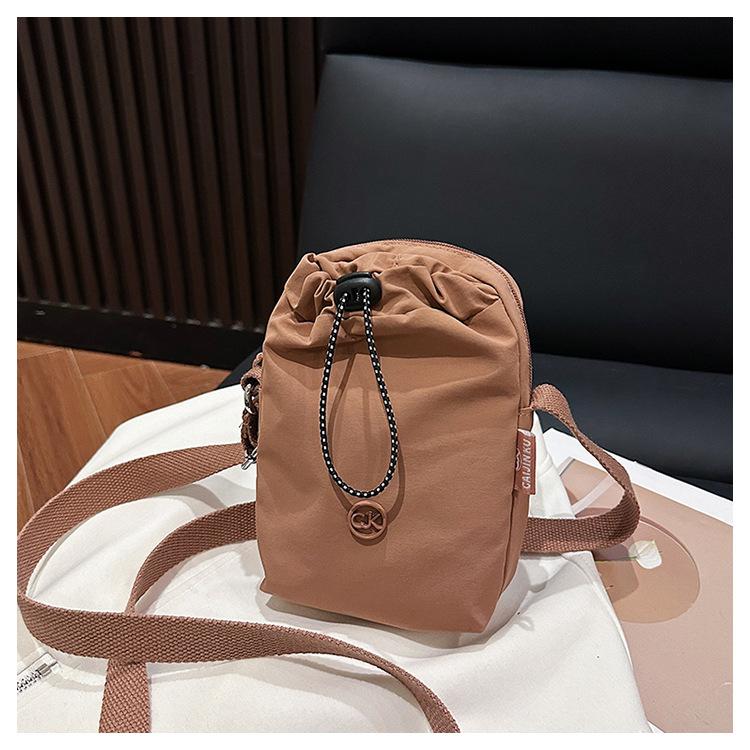 

Small bag new drawstring simple mobile phone bag change bag fashionable versatile shoulder messenger bag розовый