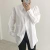 Korean chic autumn niche simple lapel irregular single-breasted loose solid color bubble sleeve shirt top women