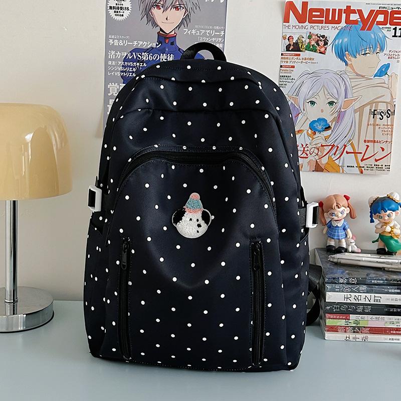

Korean polka dot schoolbag ins niche middle and high school students versatile cute computer backpack lightweight travel backpack