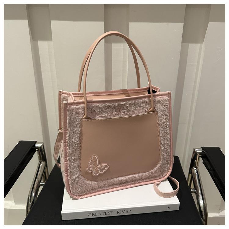 

2025 new Mao Mao splicing PU large-capacity fashion butterfly simple casual hand carry winter crossbody shoulder women s bag розовый