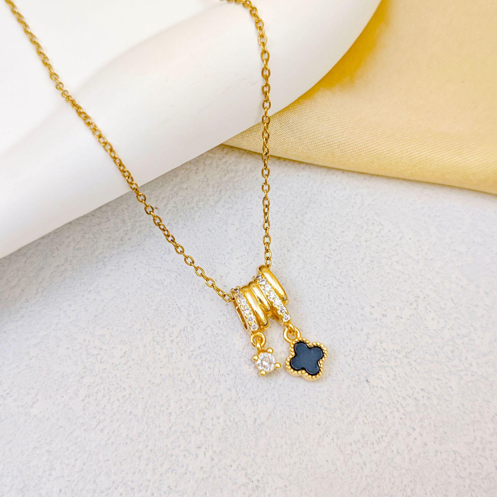 Four-Leaf Clover Titanium Steel Necklace: Luxurious, Versatile, Zirconia-Paved Clavicle Chain Jewelry for Women.
