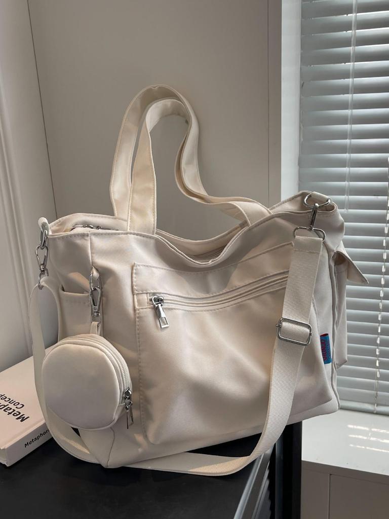 Japanese-Style Canvas Crossbody Bag: Double Pocket, Large Capacity, Women's Tote, Solid Color, Perfect for Students and Commuting.