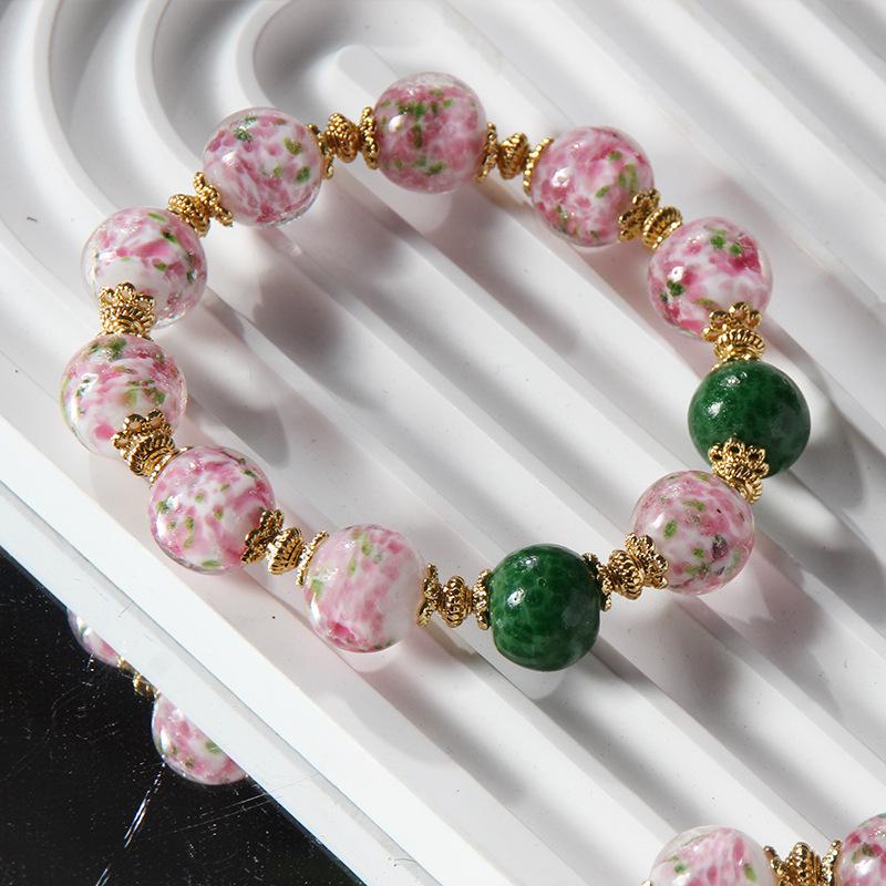 

Zibo Retro Phoenix Tail Handmade Bracelet with Pink & Kingfisher Green Beads