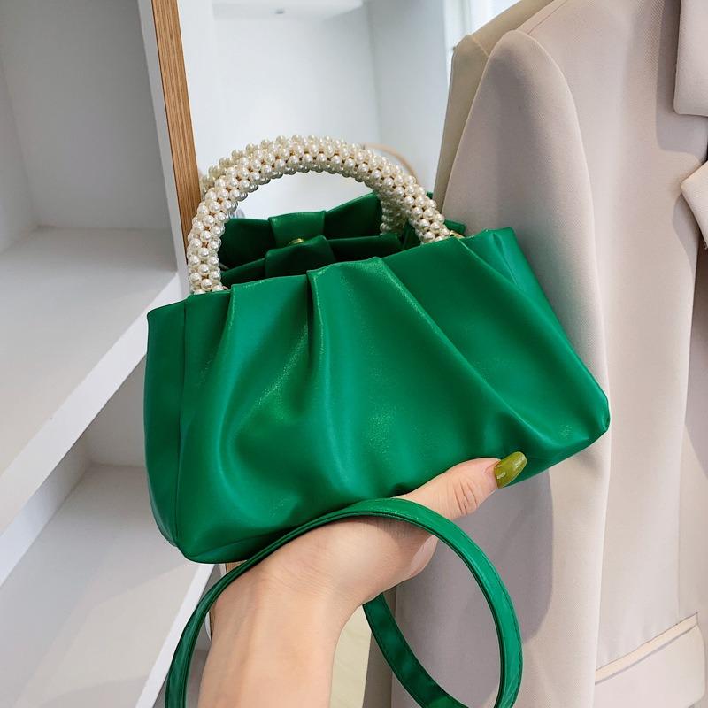 Solid color women's bag, summer new cloud bag, fashionable softfaced portable small bag, simple foreign style single shoulder oblique span bag