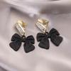 Elegant Clip-On Triangle Earrings for Non-Pierced Ears - Versatile, Light Luxury for Everyday Wear.