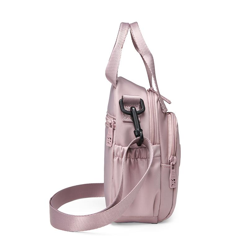 Kompakt Nylon Crossbody Miniryggsäck med Topphandtag Casual Liten Dagryggsäcksväska för Kvinnor Daglig Resa
