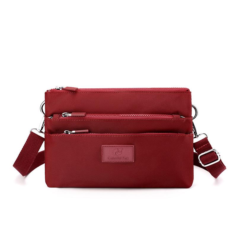 Crossbody bag women's large-capacity multi-layer shoulder bag simple versatile anti-splashing bag