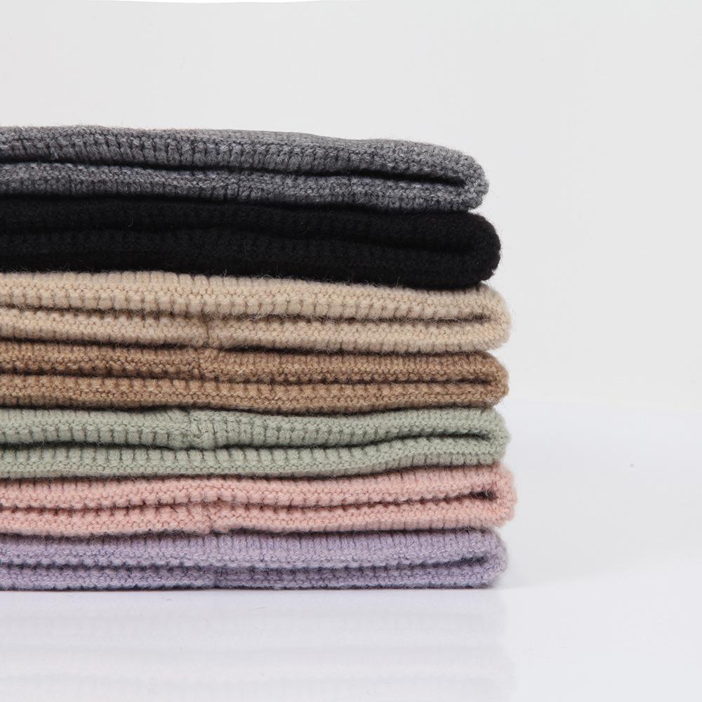Wool hat women's autumn and winter simple solid color warm hemming thickened pullover cold hat men's knitted hat