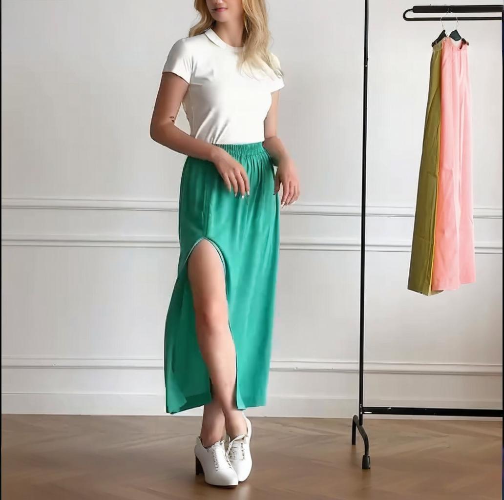 

Летняя мода 2025 года: Женская элегантная миди-юбка с разрезом и эластичной талией Extra Small