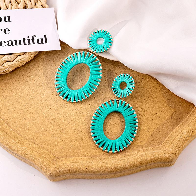 Exaggerated Oval Leather Dangle Earrings: Colorful, Hollow, Holiday Style