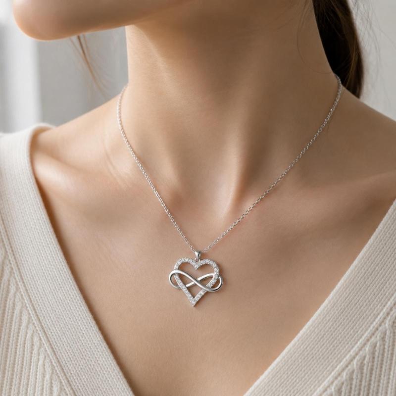 Zircon Heart Pendant Necklace with Smooth Figure-Eight Form, Polished Alloy Construction Neckchain, and Electroplated Finish