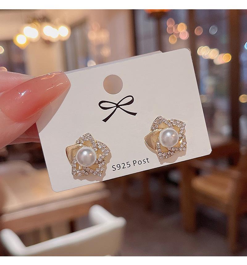 Exquisite diamond studded rose earrings with a luxurious and socialite style design, featuring pearl earrings and earrings
