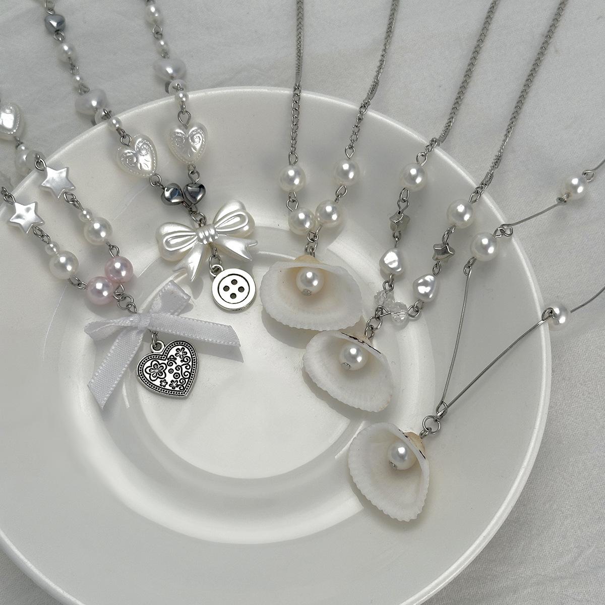 

Pastoral fresh bow pearl necklace, cute retro coin heart-shaped shell item