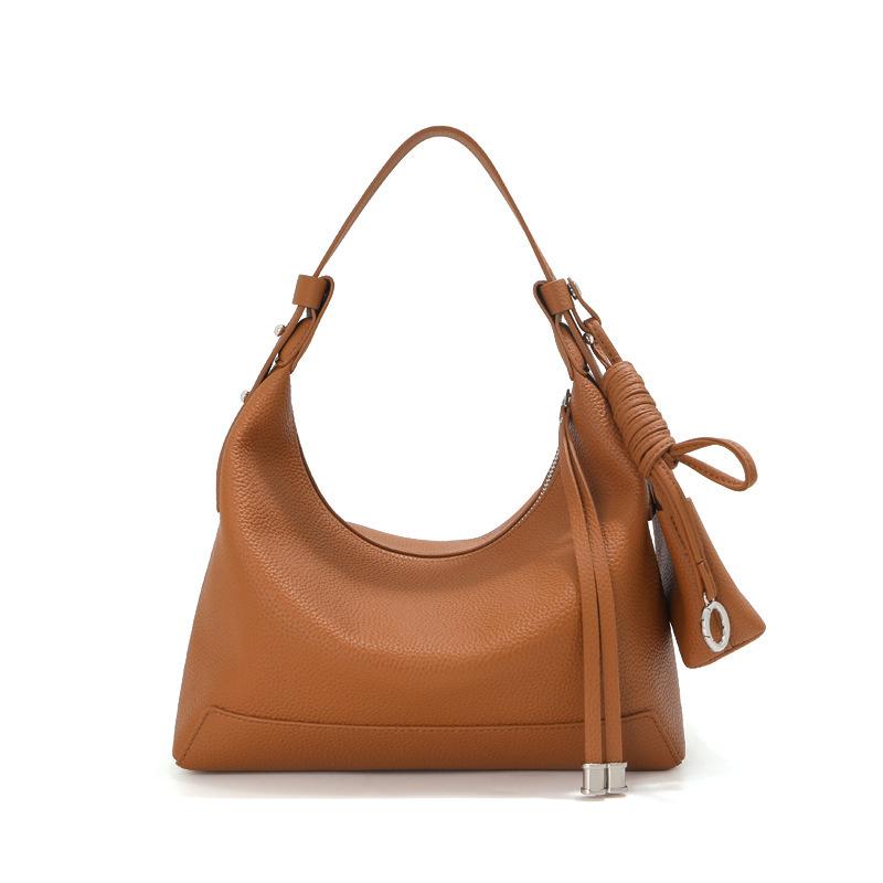 

Hobo first layer cowhide shoulder bag women s leather underarm bag commuter lunch box dumpling bag light luxury niche bag 25*8*20cm золотий коричневий колір