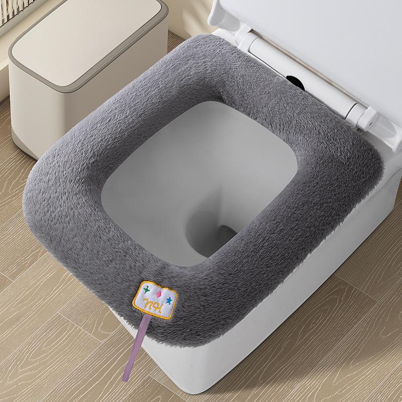 Toilet cover universal seat cushion thickened cartoon winter four seasons universal 42*37cm