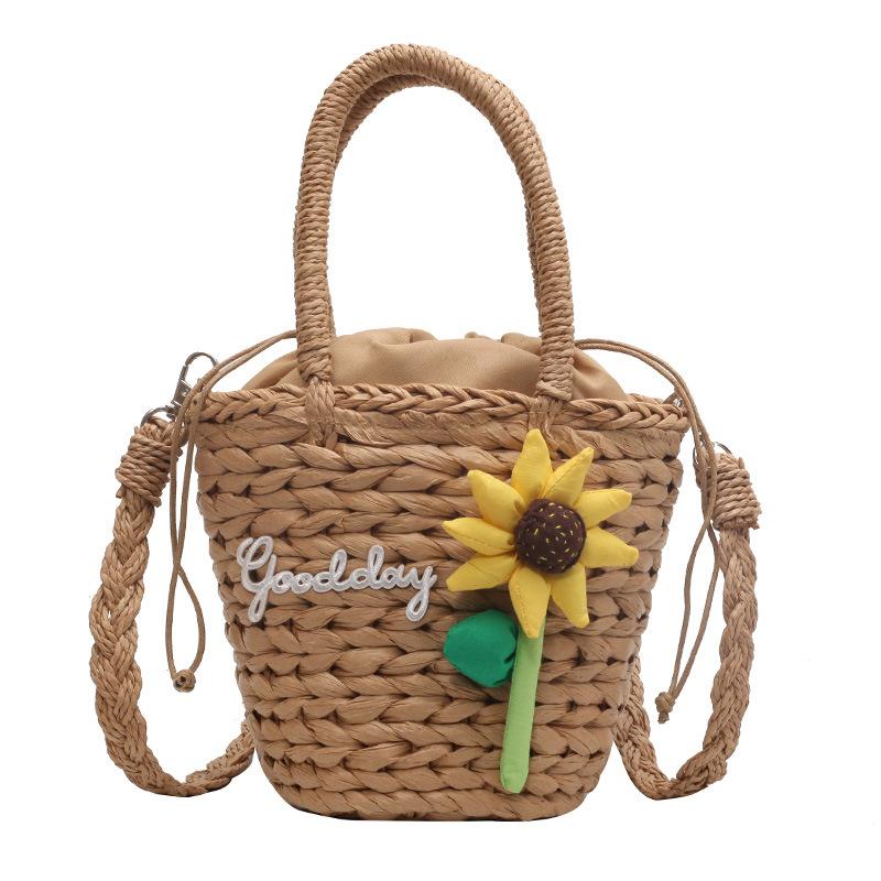 

Exquisite and cute sunflower contrasting colors woven women s bucket handbag spring new shoulder messenger bag хаки