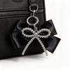 Y2K Inspired Silver Bowknot Keychain Charm with Retro Modern Design for Fashionable Bag Phone Decors Accessory Lightweight Portable