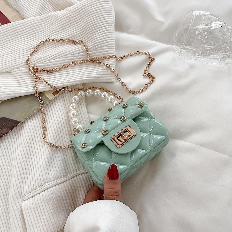 

Spring and summer small bag 2024 new mini lipstick bag pearl portable jelly bag diamond chain bag