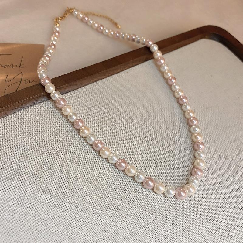 Fashion versatile color matching pearl necklace retro niche high-end sense collarbone chain personality light luxury design sense necklace women