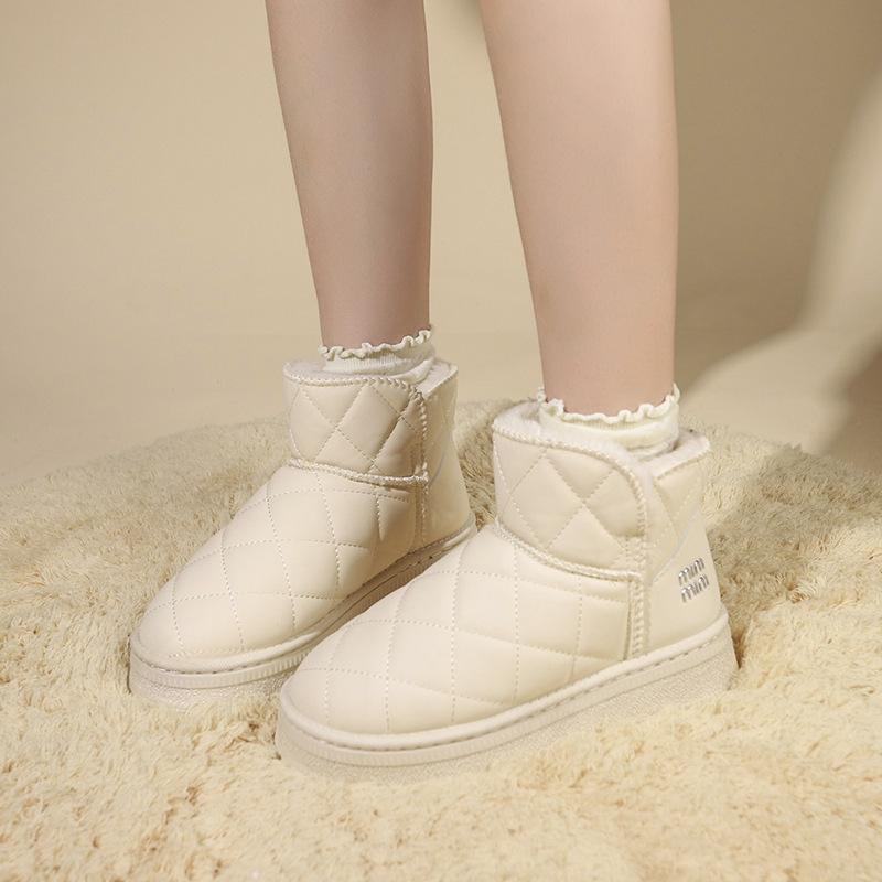 Autumn and winter snow boots women's 2025 new thick-soled thickened thermal cotton shoes with one foot pedal solid color short tube cold-proof boot