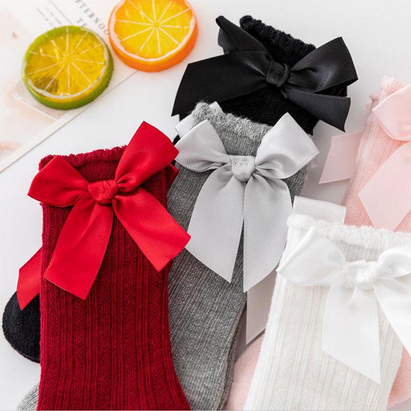 Chaussettes hautes en coton antidérapant pour nouveau-né avec nœud et rayures