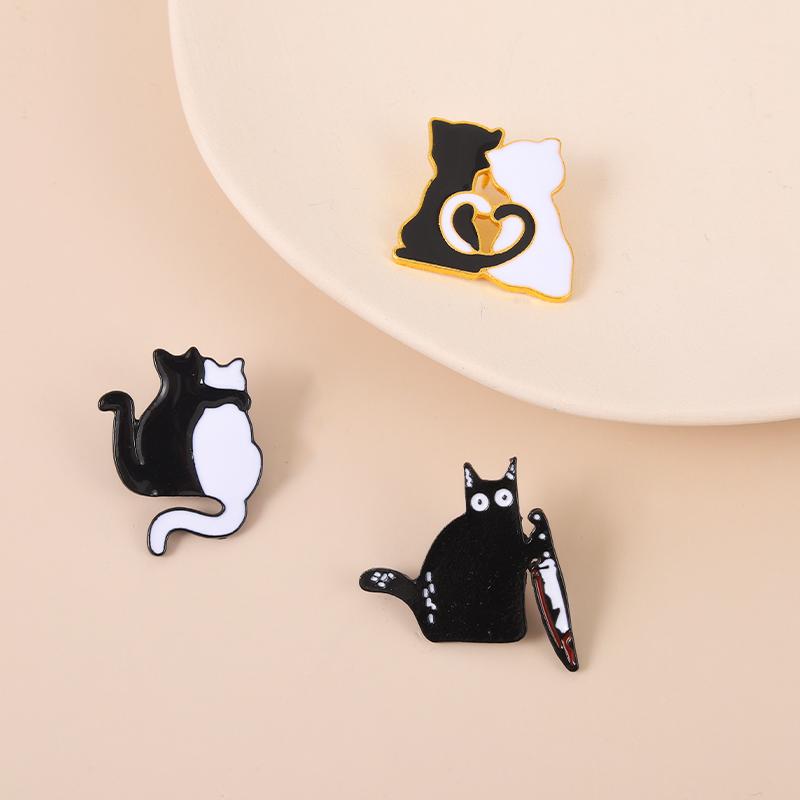 Cat lovers Enamel Pin Custom Black and White Cat Love Tail Dagger Brooches Bag Lapel Pin Gothic Badges Jewelry Gift for Friend