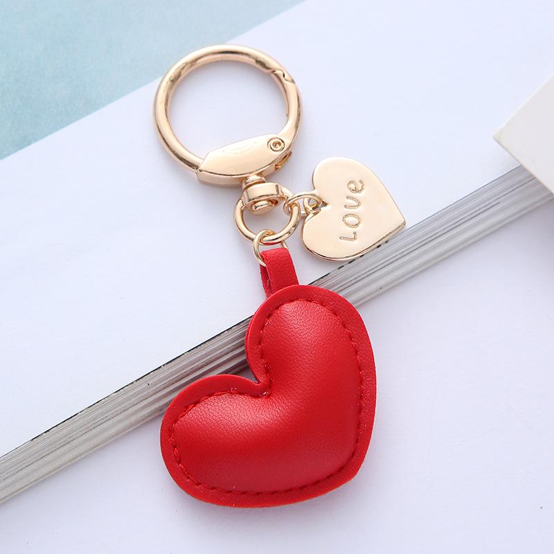 Neuer farbenfroher Leder-Herz-Schlüsselanhänger - Niedliches Legierungspendant-Accessoire