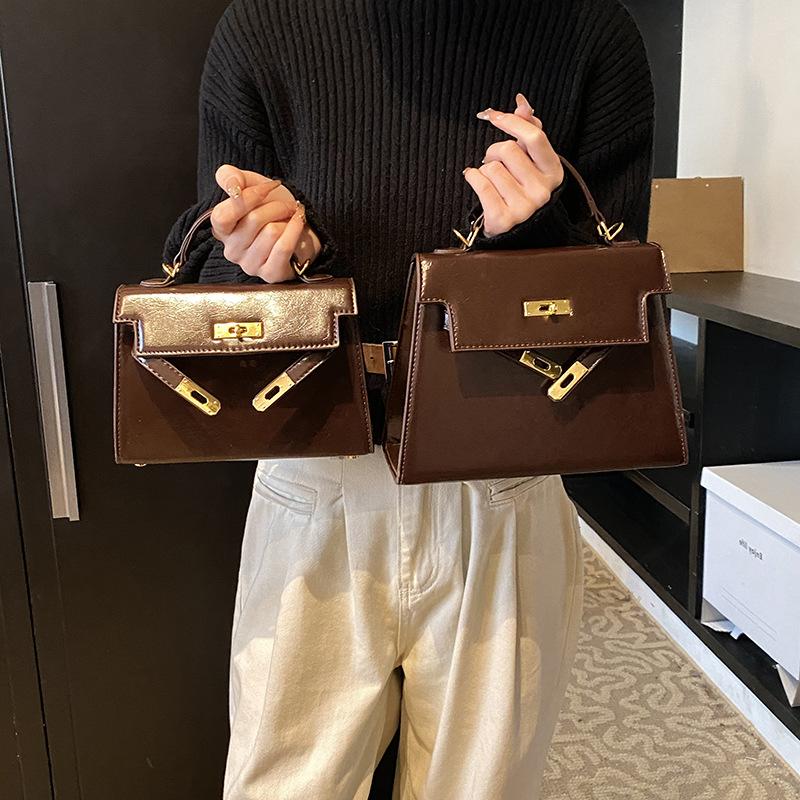 

Трендовый новый продукт ретро светлая роскошь высококлассная портативная сумка Kelly модная женская повседневная универсальная сумка через плечо/мессенджер Large 25.5 * 9 * 19 кофейный