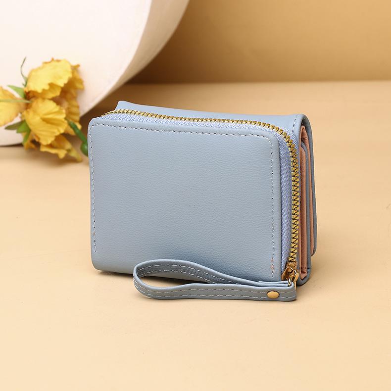 Dámská třískládací peněženka v korejském stylu pro rok 2025 se zipovou kapsou na mince a kresleným designem