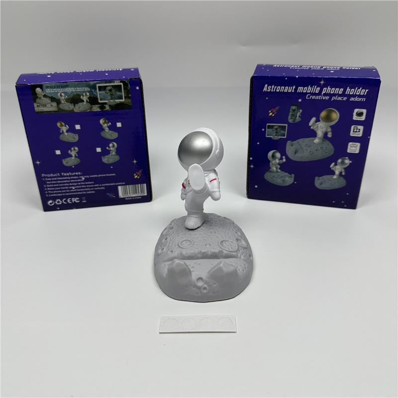 Astronaut Figurine Phone Holder: Creative Plastic Desktop Decor & Gift