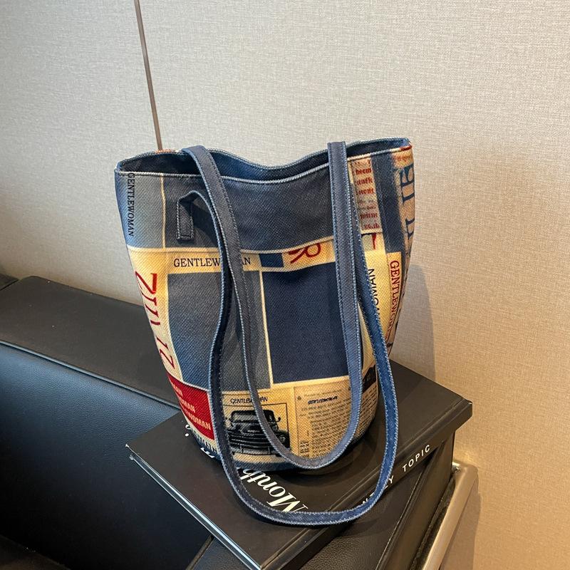 

Жіноча сумка-відро великої місткості під пахвами Нова корейська версія 2024 р. Модна модна сумка через плече Універсальна жіноча сумка для приміських поїздок