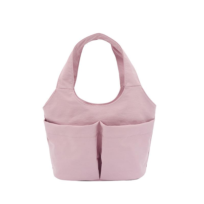 Women's casual simple solid color multipocket summer new fashion go out portable handbag
