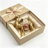 Goldene Kamelharzfigur, Exotische dekorative Kamelstatue, Luxuriöse Tierskulptur für Zuhause & Büro