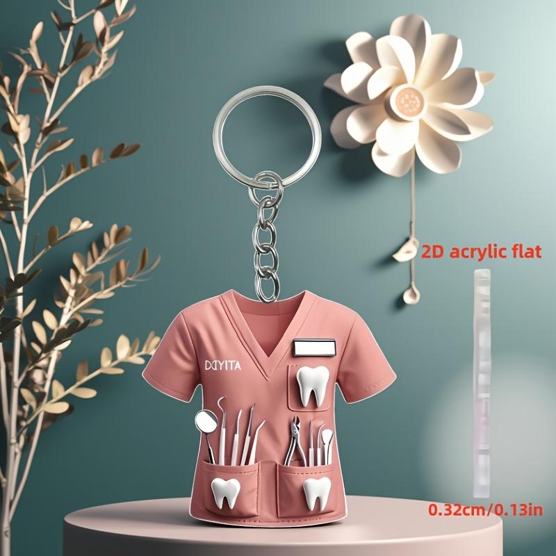 2D Acrylic Dentist Keychain Charming Pink Costume Design with Dental Tools, Waterproof Acrylic, Ideal Gift for Female Dental Professionals