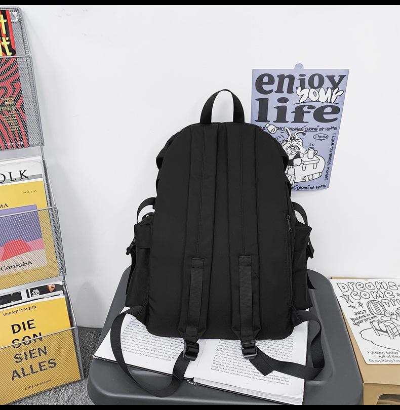 Ryggsäck för män med stor kapacitet och enfärgad design för studenter eller par