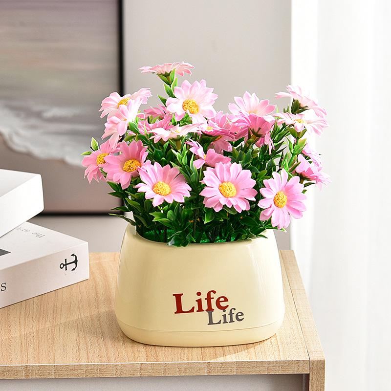 Living Room Decor: Artificial Sunflower and Green Plant Arrangements, Small Potted Plants, and Plastic Bouquets