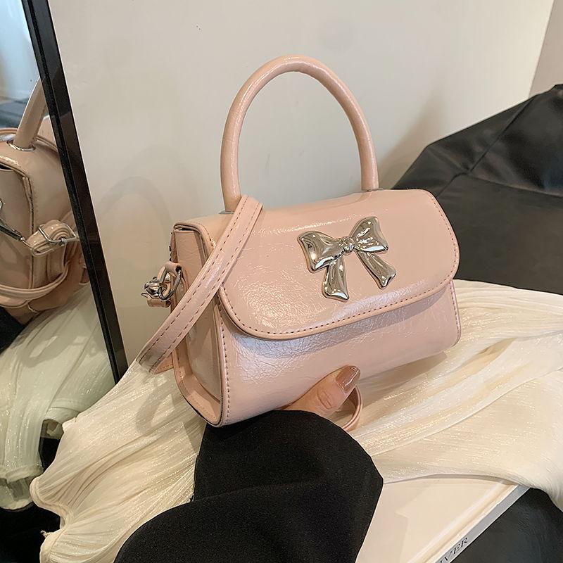 

Sense niche bow bag new fashion messenger bag French versatile shoulder handbag factory supply chain рожевий