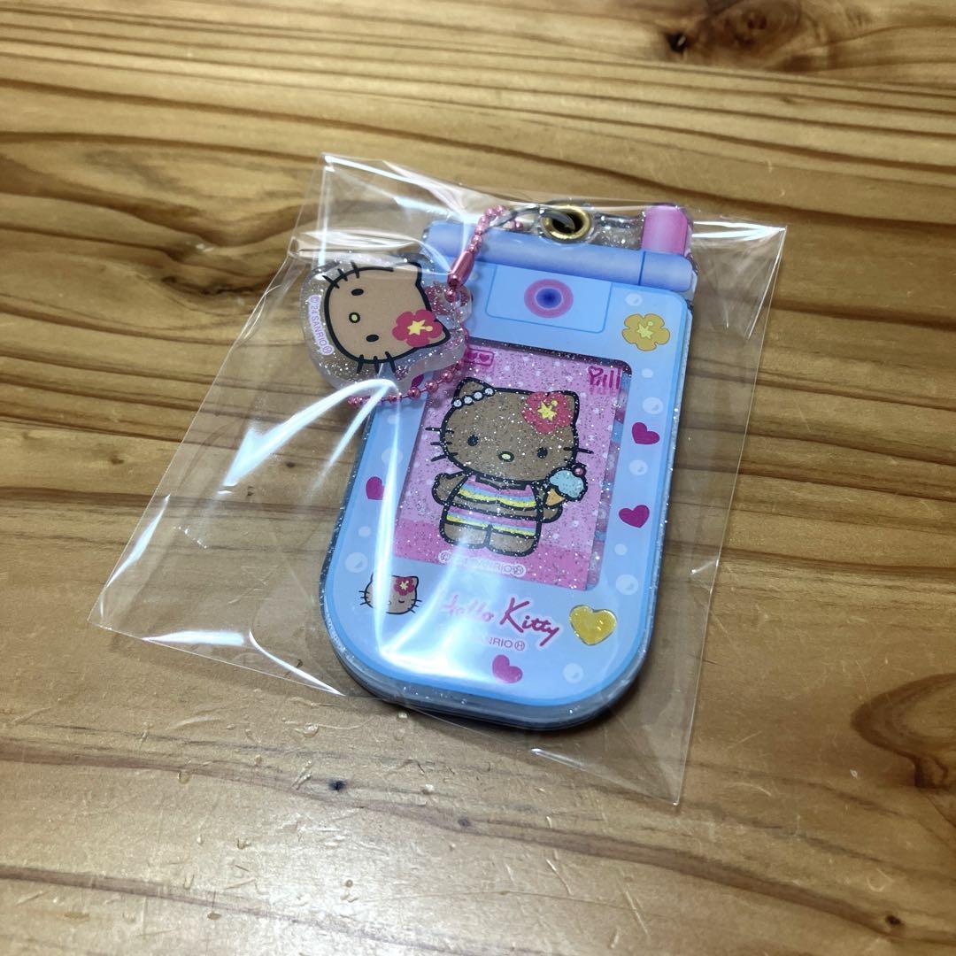 

[USED] Hello Kitty Slide-On Flip Phone Keychain Tanned Kitty Prize